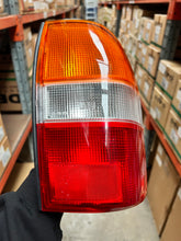 Load image into Gallery viewer, NEW TAIL LIGHT REAR REPLACEMENT TRITON 10/96-5/01 AMBER/CLAR/RED LH MB590620LH